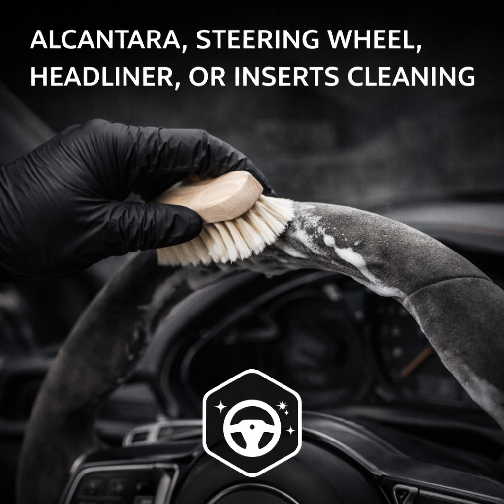 A gloved hand cleaning a suede steering wheel with a brush. Text reads "Alcantara, Steering Wheel, Headliner, or Inserts Cleaning," conveying precision and care.